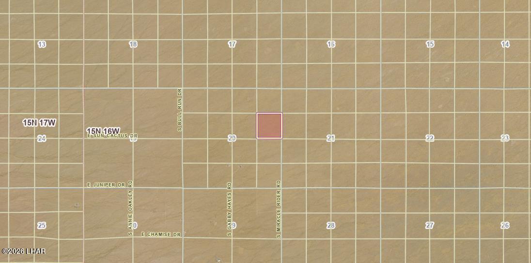 Parcel2328 South Tom Mix Road Yucca, AZ 86438 - Photo 3 of 17 a bathroom with a blue walls