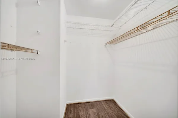 a view of small space with racks on the wall