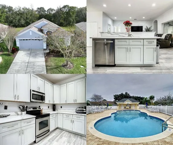 a kitchen with stainless steel appliances kitchen island granite countertop a sink and cabinets
