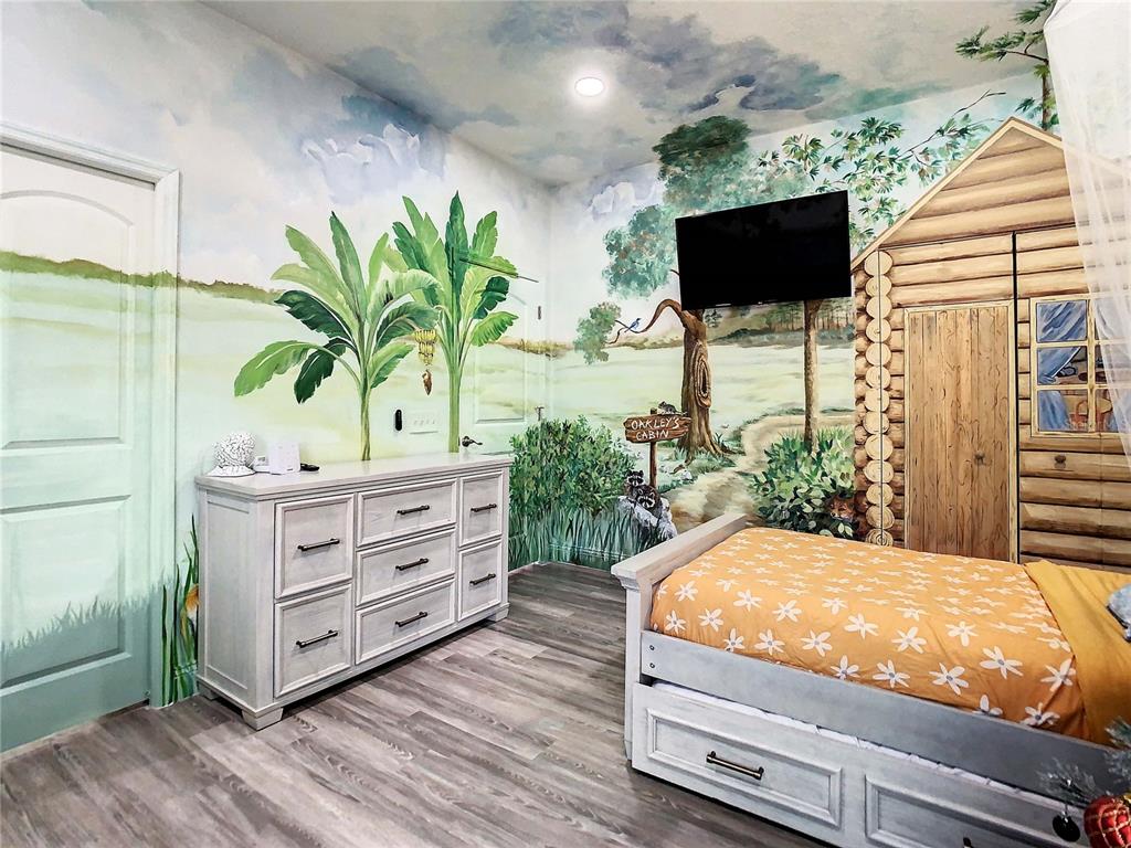 2841 Banyan Hill Lane Land O' Lakes, FL 34639 - Photo 5 of 20 a living room with furniture and a flat screen tv