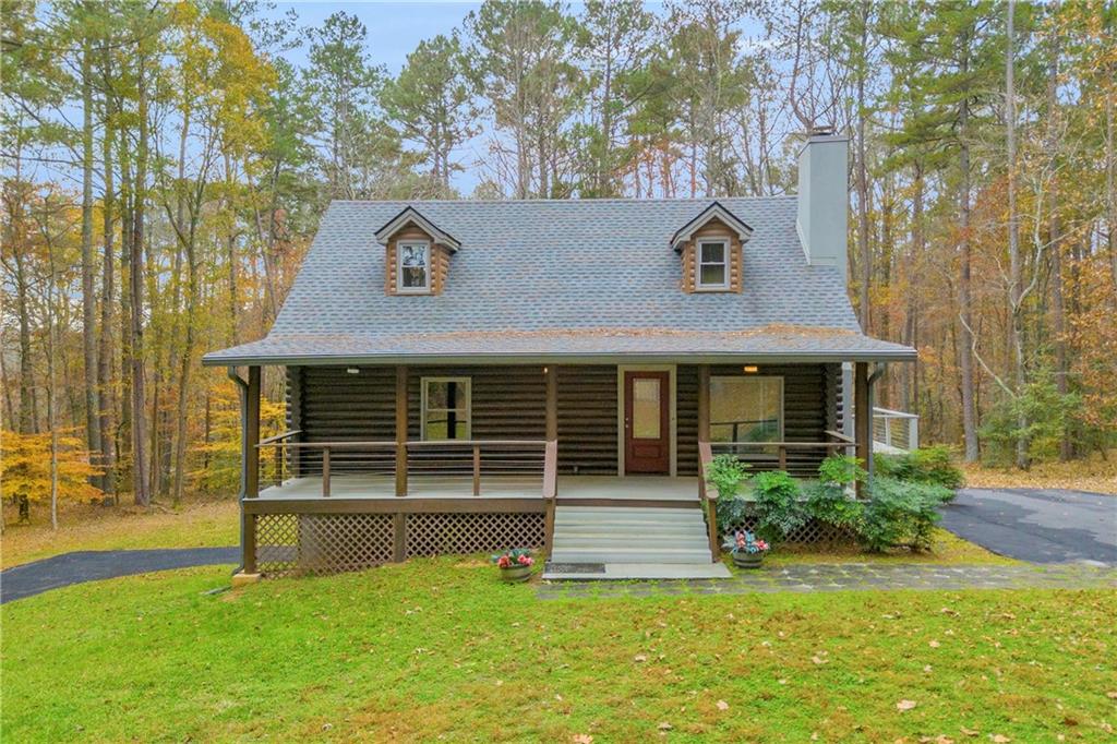 2885 Callie Still Road Lawrenceville, GA 30045 - Photo 1 of 79 a view of outdoor space yard and front view of a house