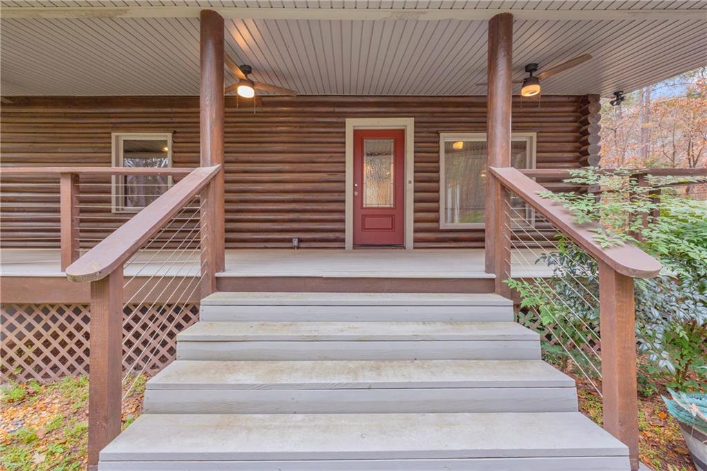 2885 Callie Still Road Lawrenceville, GA 30045 - Photo 17 of 79 a view of entryway with wooden floor and a front door