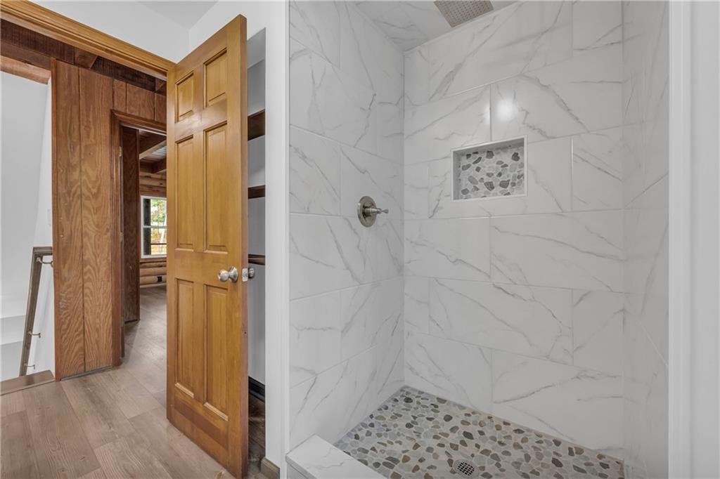 2885 Callie Still Road Lawrenceville, GA 30045 - Photo 39 of 79 a bathroom with a shower