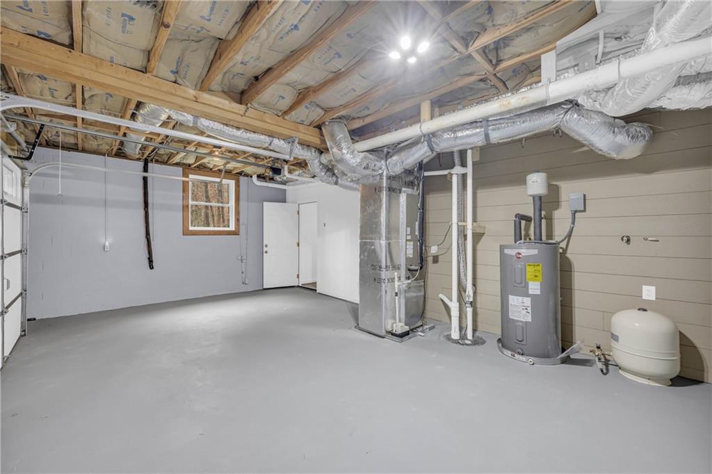 2885 Callie Still Road Lawrenceville, GA 30045 - Photo 48 of 79 a view of empty room with air conditioner and windows