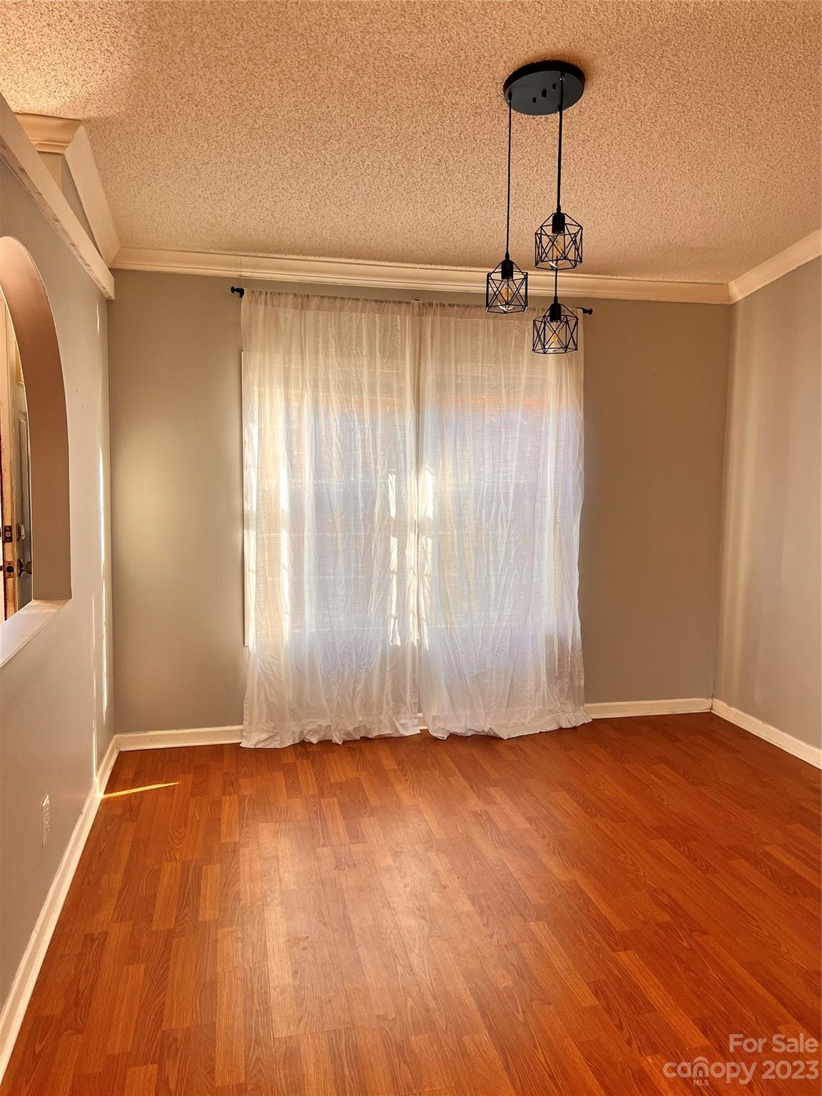 1864 Coopers Gap Road Rutherfordton, NC 28139 - Photo 24 of 46 a view of room with hardwood floor and a ceiling fan