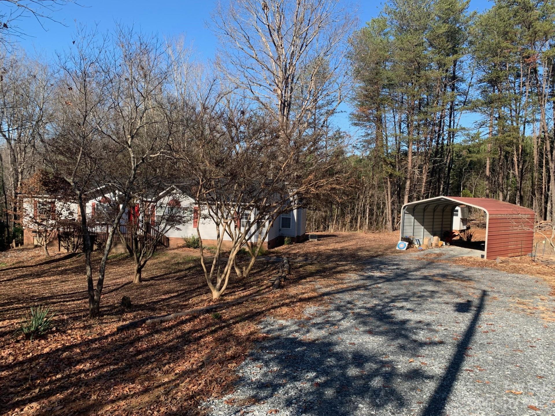 1864 Coopers Gap Road Rutherfordton, NC 28139 - Photo 3 of 46 a view of a yard with plants and trees