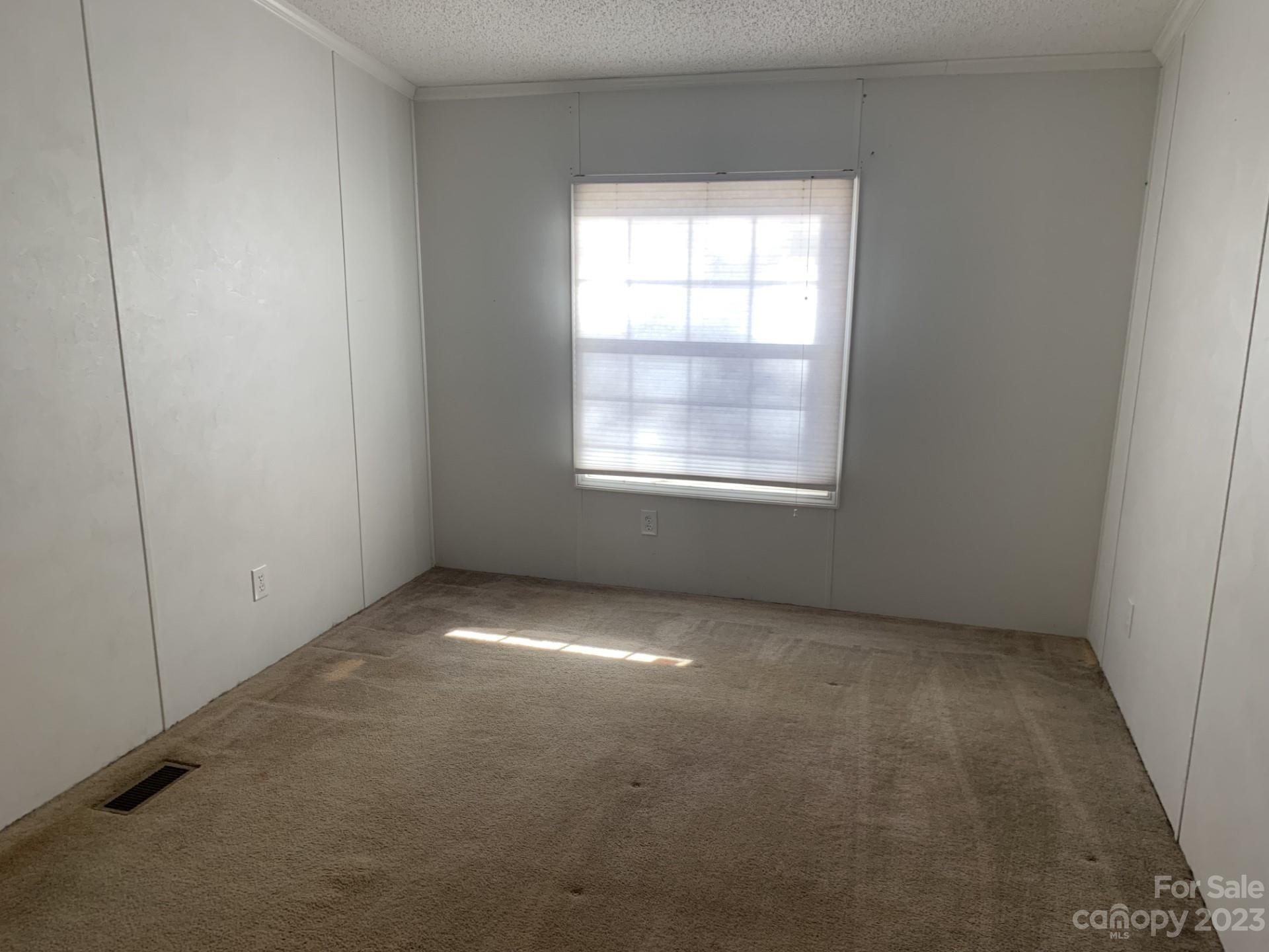 1864 Coopers Gap Road Rutherfordton, NC 28139 - Photo 35 of 46 an empty room with a window