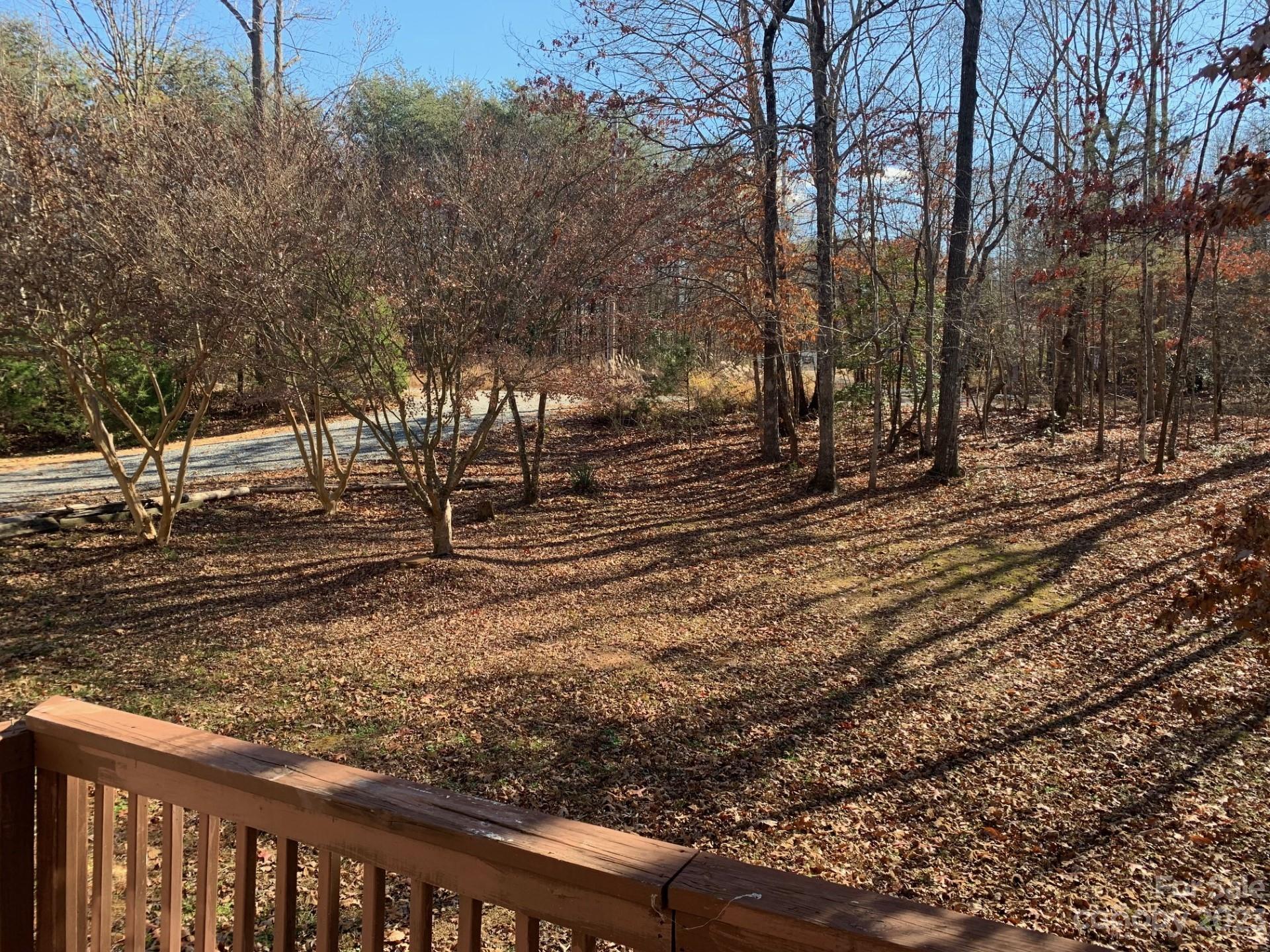1864 Coopers Gap Road Rutherfordton, NC 28139 - Photo 40 of 46 a view of a yard with wooden fence