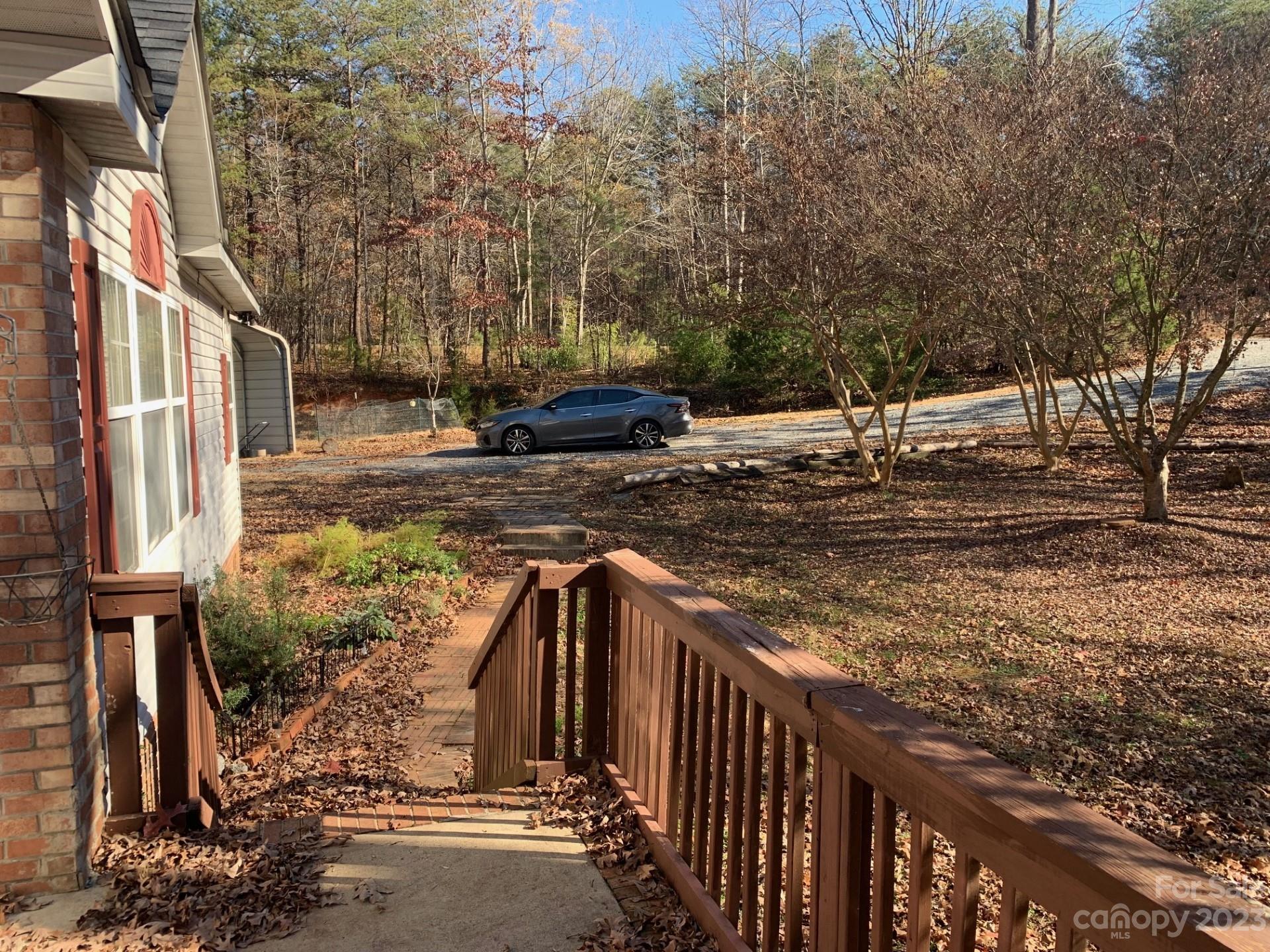 1864 Coopers Gap Road Rutherfordton, NC 28139 - Photo 10 of 46 a view of a yard with wooden fence