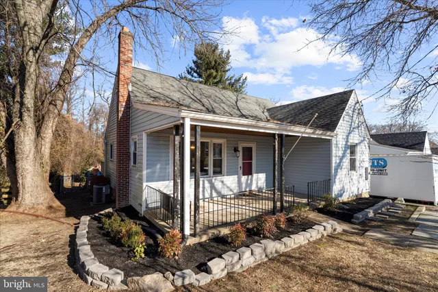 a kitchen with stainless steel appliances a stove sink and microwave