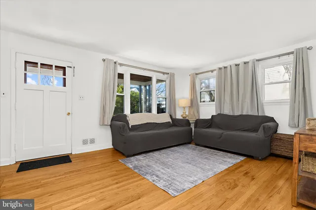 a bathroom with a sink vanity and toilet