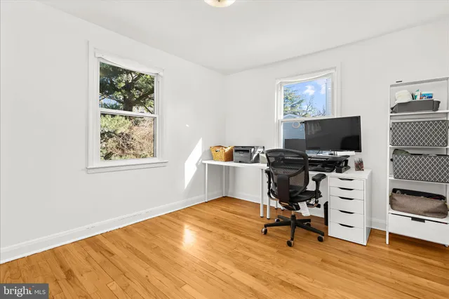 a bed room with a bed and a window