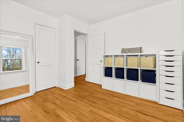 a room with furniture and a wooden floor