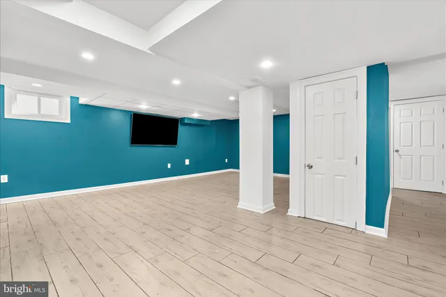 a bedroom with bed and window