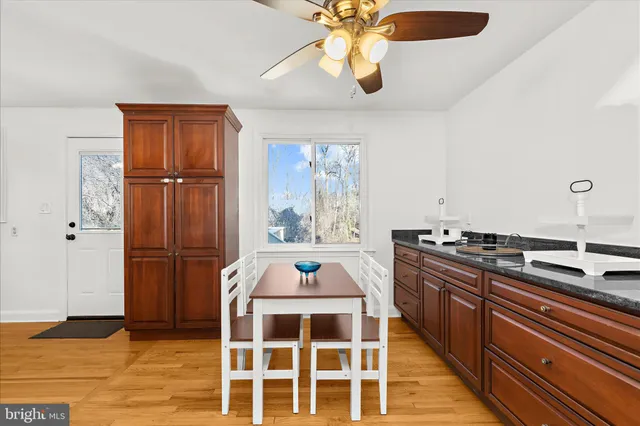 a bathroom with a sink toilet and vanity