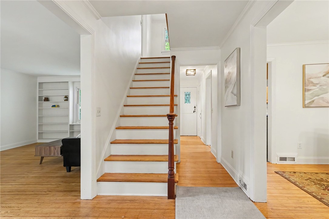 374 Ashbourne Road Brighton, NY 14618 - Photo 5 of 33 Gleaming hardwood floors on the first and second floor.