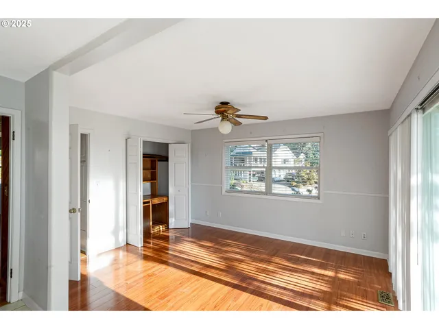a view of an empty room and window