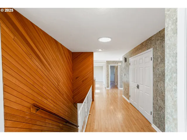 a bathroom with a shower sink and mirror