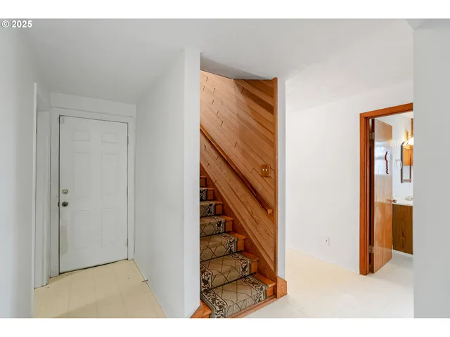 a bathroom with a sink mirror and vanity