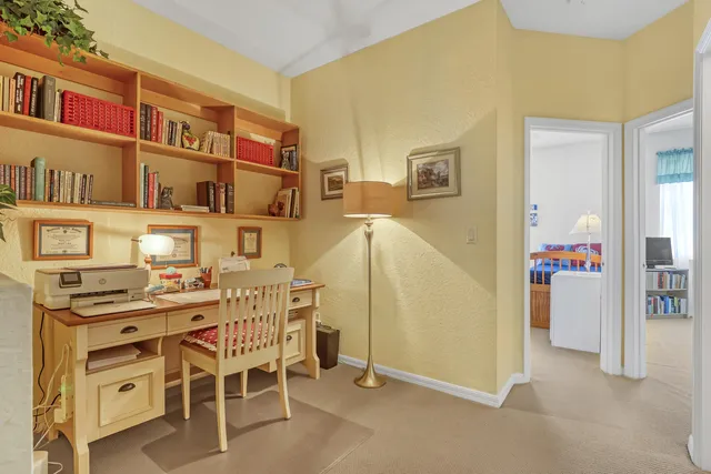 a view of a livingroom with furniture and window