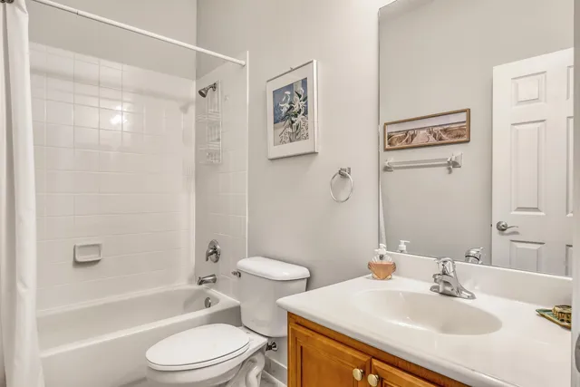 a bathroom with a sink a toilet and a bathtub