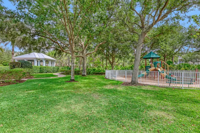 a view of a house with a back yard