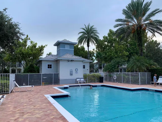 a view of a house with swimming pool
