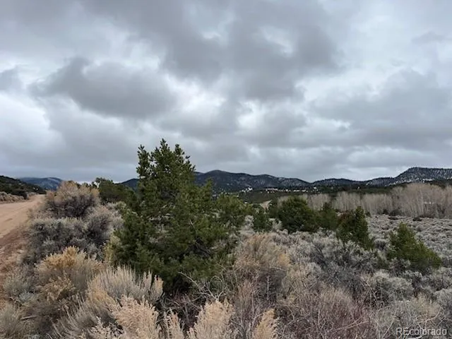 a view of a lake with mountains in the background