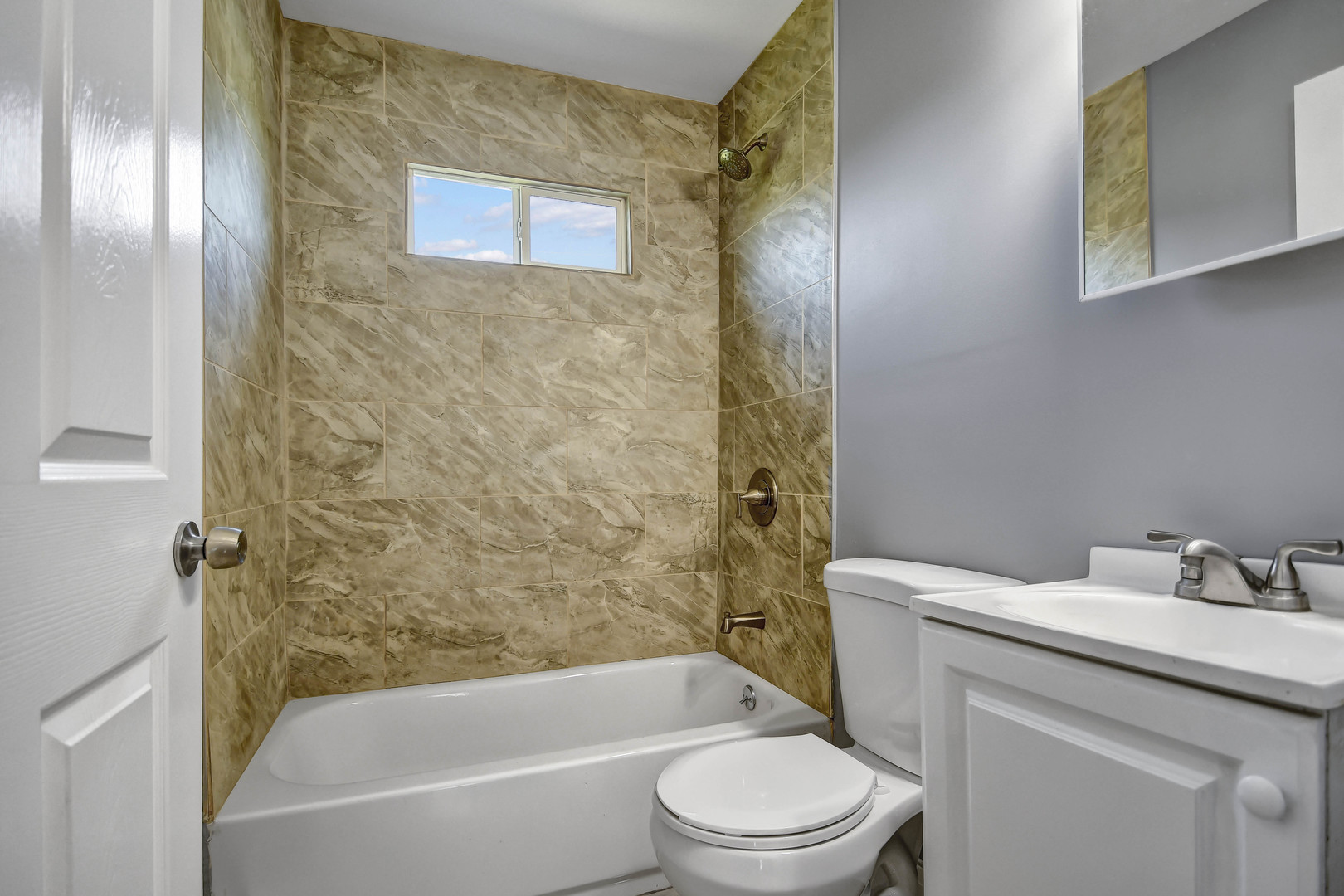 1897 Division Street Chicago Heights, IL 60411 - Photo 11 of 14 a bathroom with a sink toilet and shower