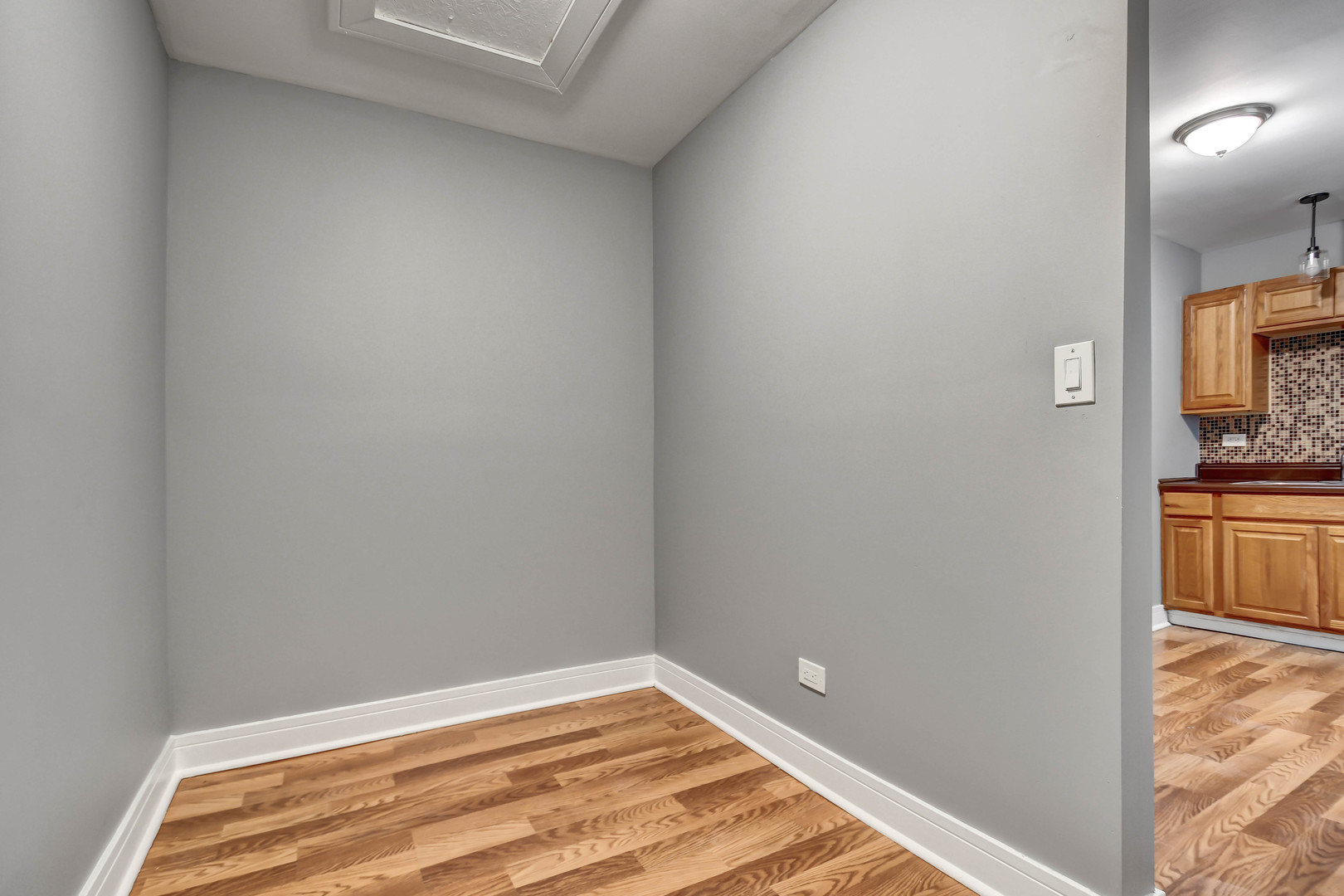 1897 Division Street Chicago Heights, IL 60411 - Photo 7 of 14 a view of a room with wooden floor and staircase