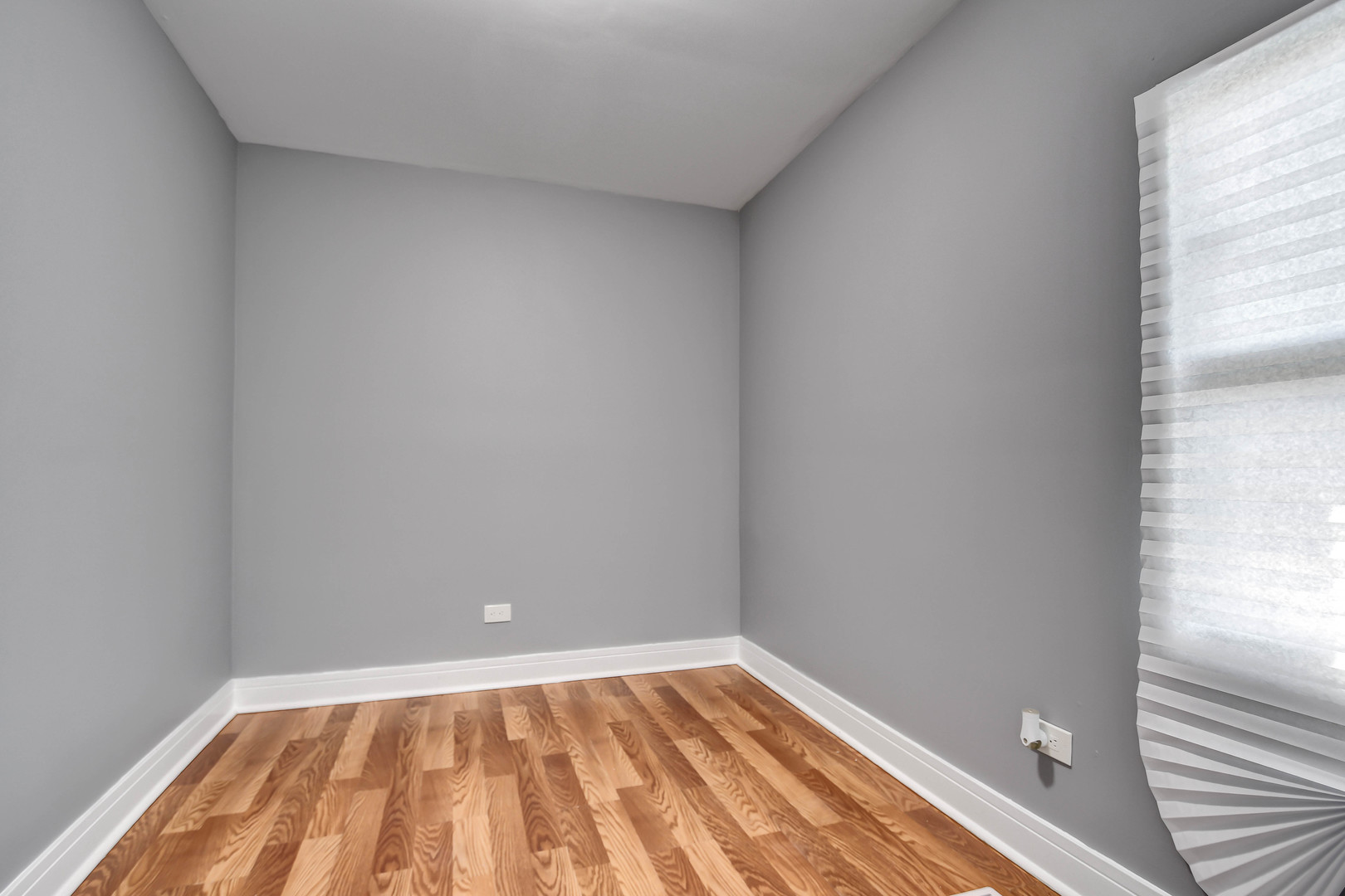 1897 Division Street Chicago Heights, IL 60411 - Photo 10 of 14 a view of an empty room and wooden floor