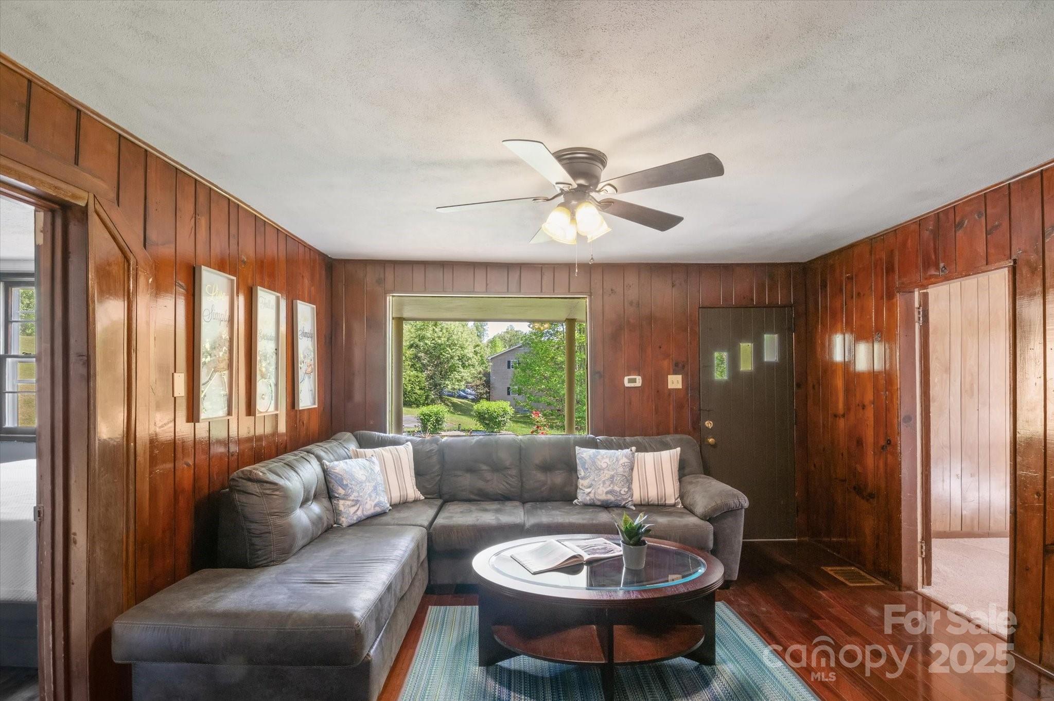35 Homeway Road Asheville, NC 28806 - Photo 12 of 32 a living room with furniture and a large window