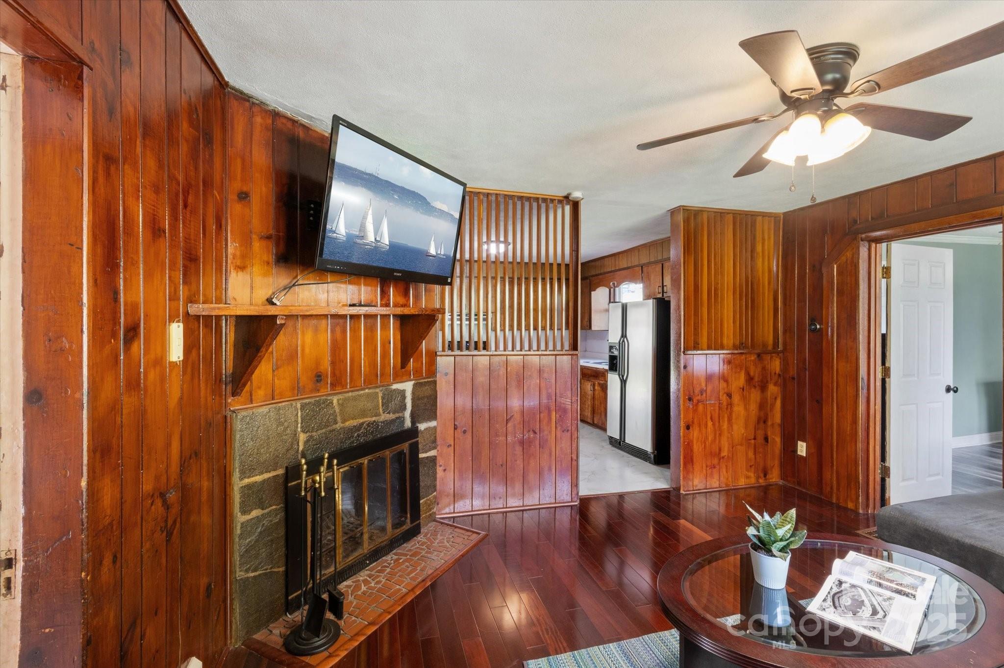 35 Homeway Road Asheville, NC 28806 - Photo 15 of 32 a view of a livingroom with furniture and hardwood floor