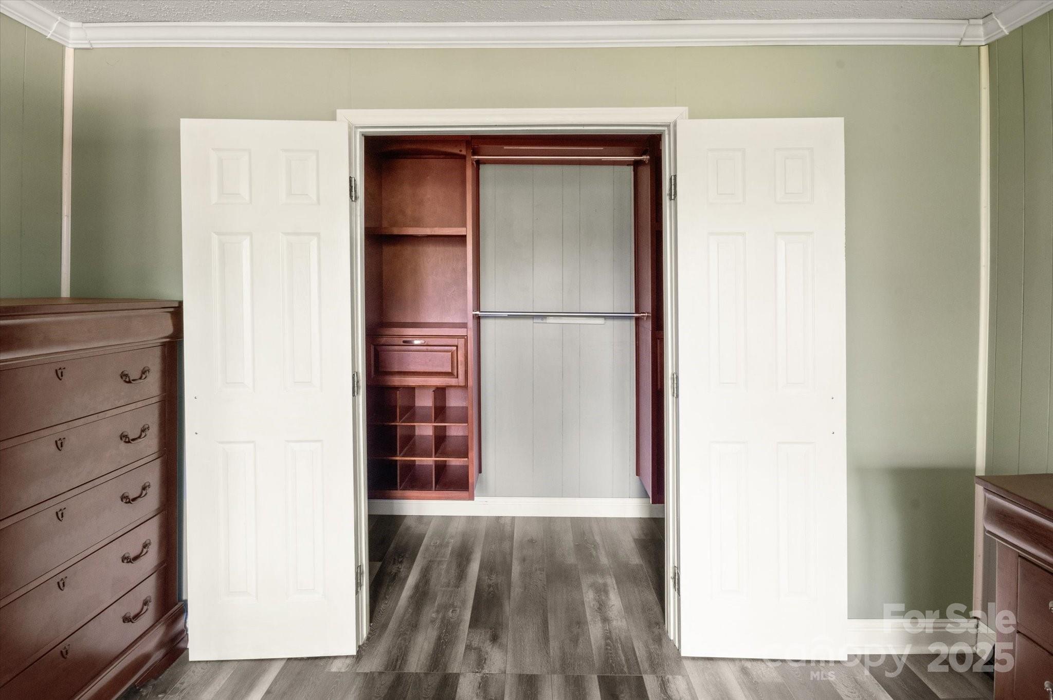 35 Homeway Road Asheville, NC 28806 - Photo 18 of 32 a view of walk in closet with empty racks