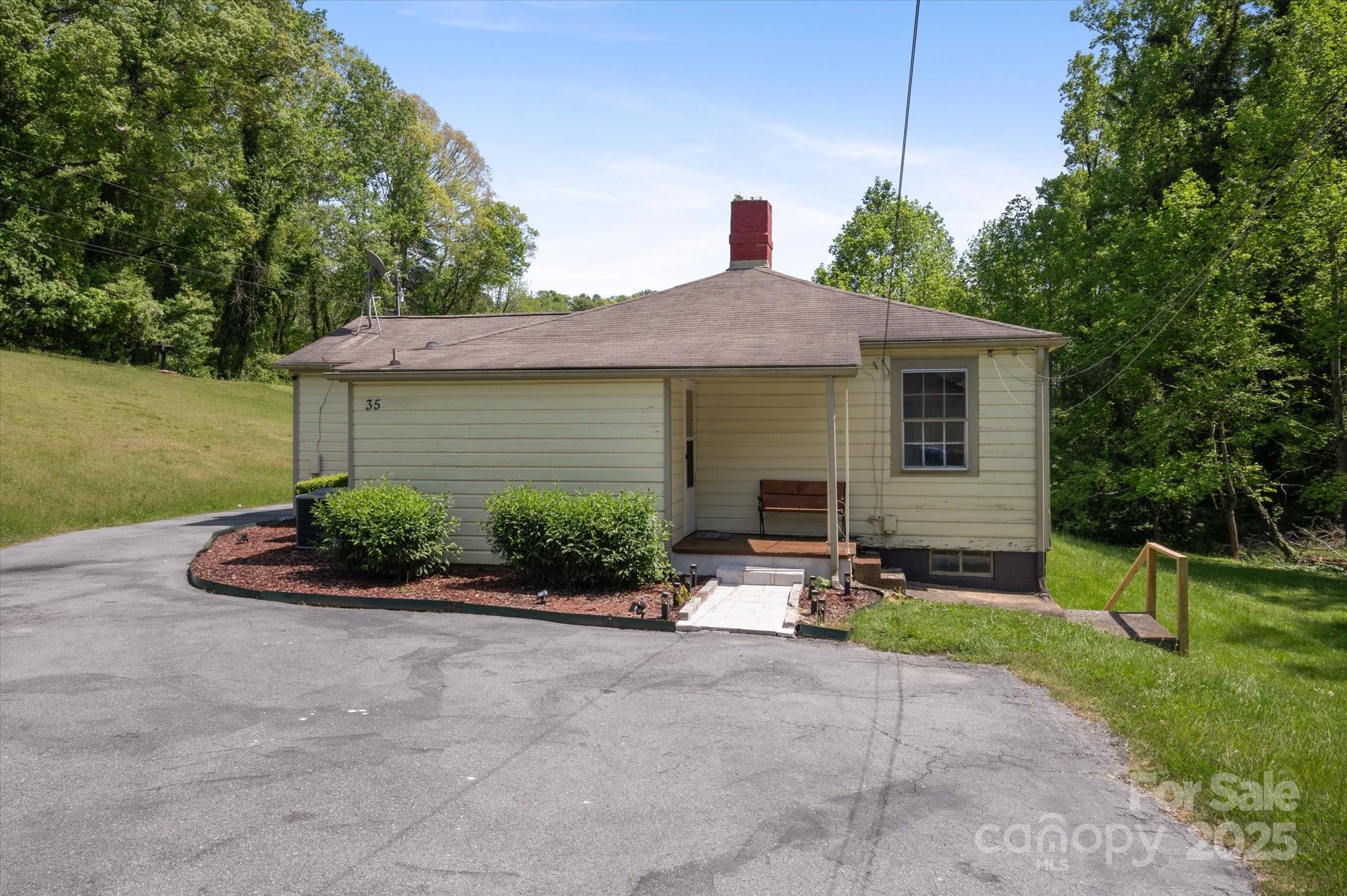 35 Homeway Road Asheville, NC 28806 - Photo 2 of 32 a front view of house with yard and green space