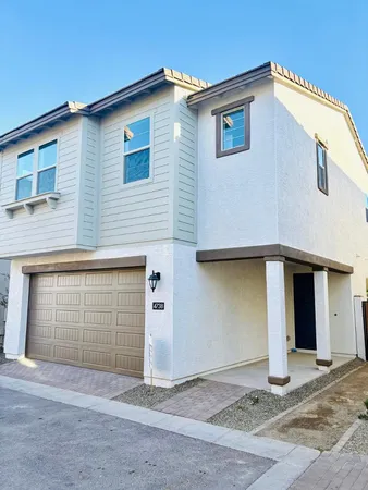 a view of a house with garage