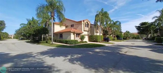 a view of a street with a building in the background