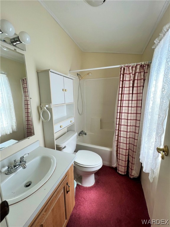2336 South Rease Road Kingman, AZ 86401 - Photo 18 of 41 Full bathroom featuring shower / tub combo with curtain, oversized vanity, and toilet