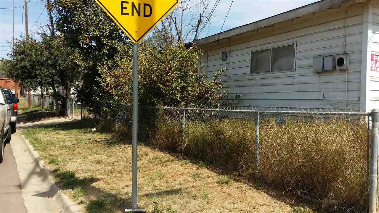 1102 Willow Street Laredo, TX 78040 - Photo 2 of 6 a backyard of a house with lots of green space