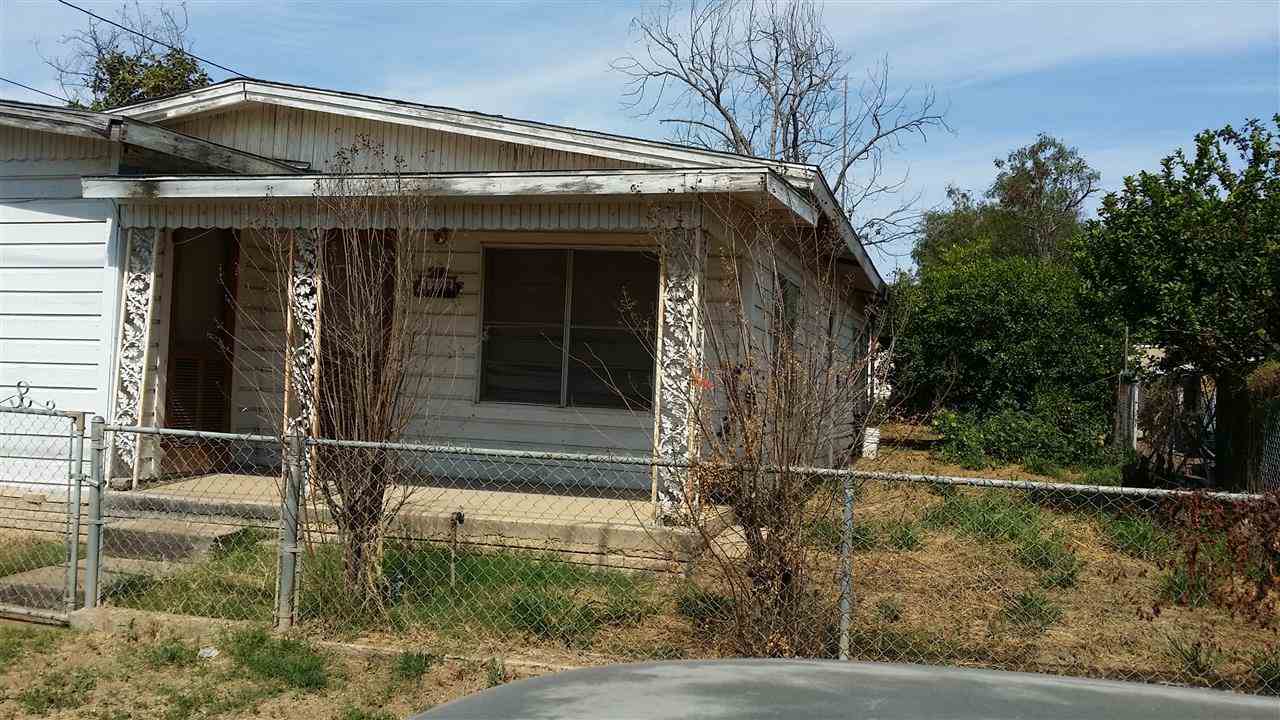 1102 Willow Street Laredo, TX 78040 - Photo 3 of 6 front view of a house with a yard