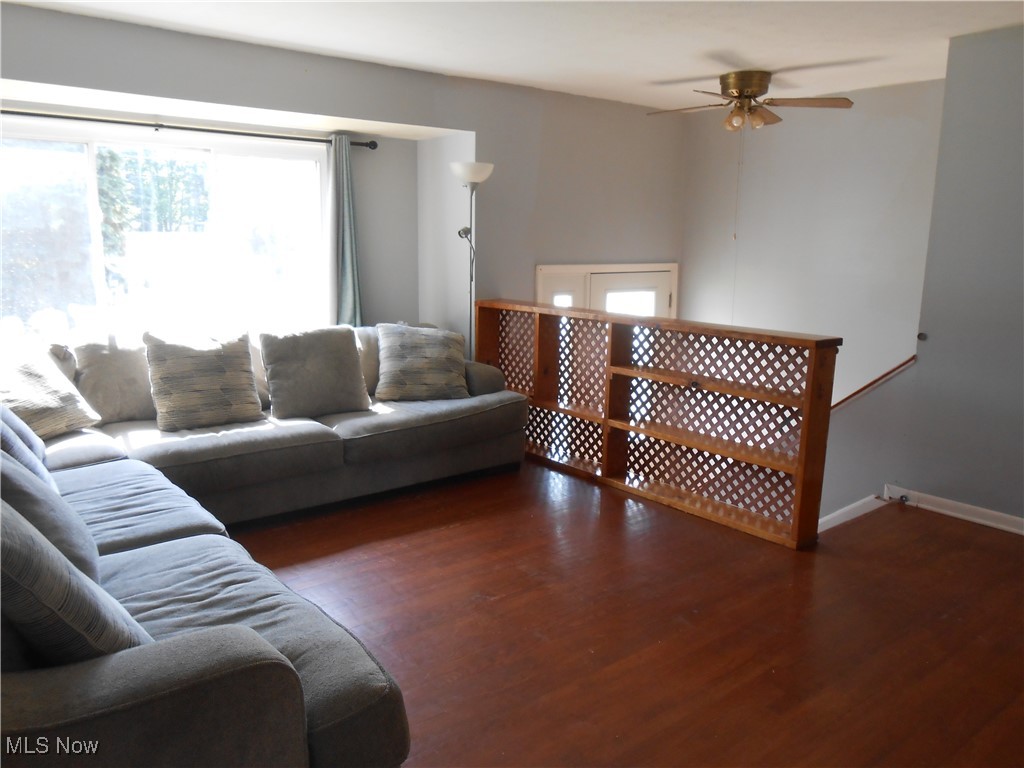 17022 Howe Road Strongsville, OH 44136 - Photo 7 of 22 Living room featuring ceiling fan and wood finished floors