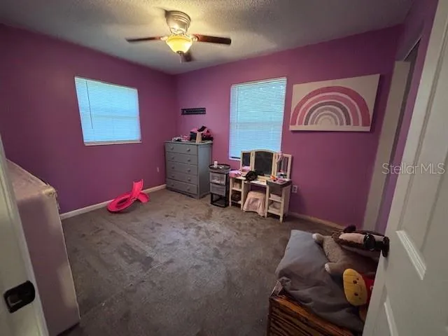 a bathroom with a sink toilet and vanity