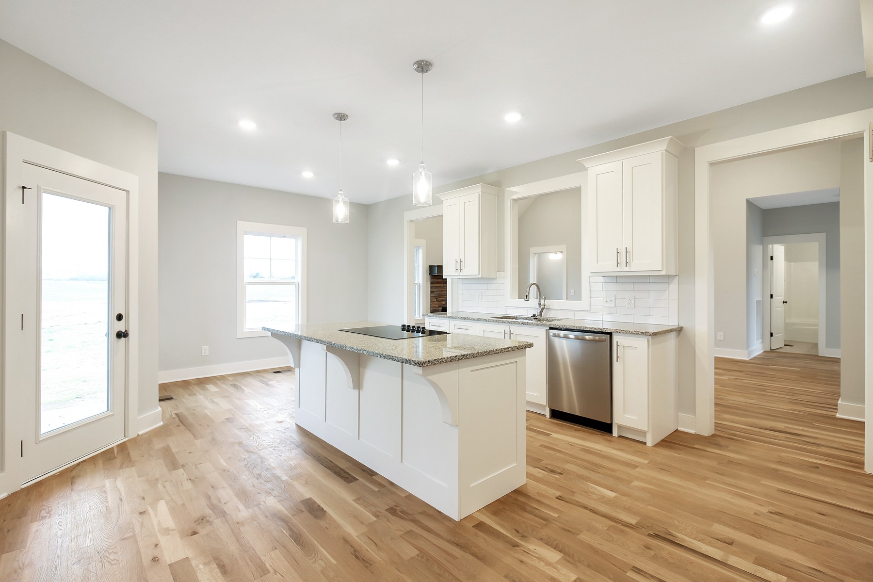 4889 Barren Plains Road Springfield, TN 37172 - Photo 4 of 17 a kitchen with granite countertop a sink and a stove top oven