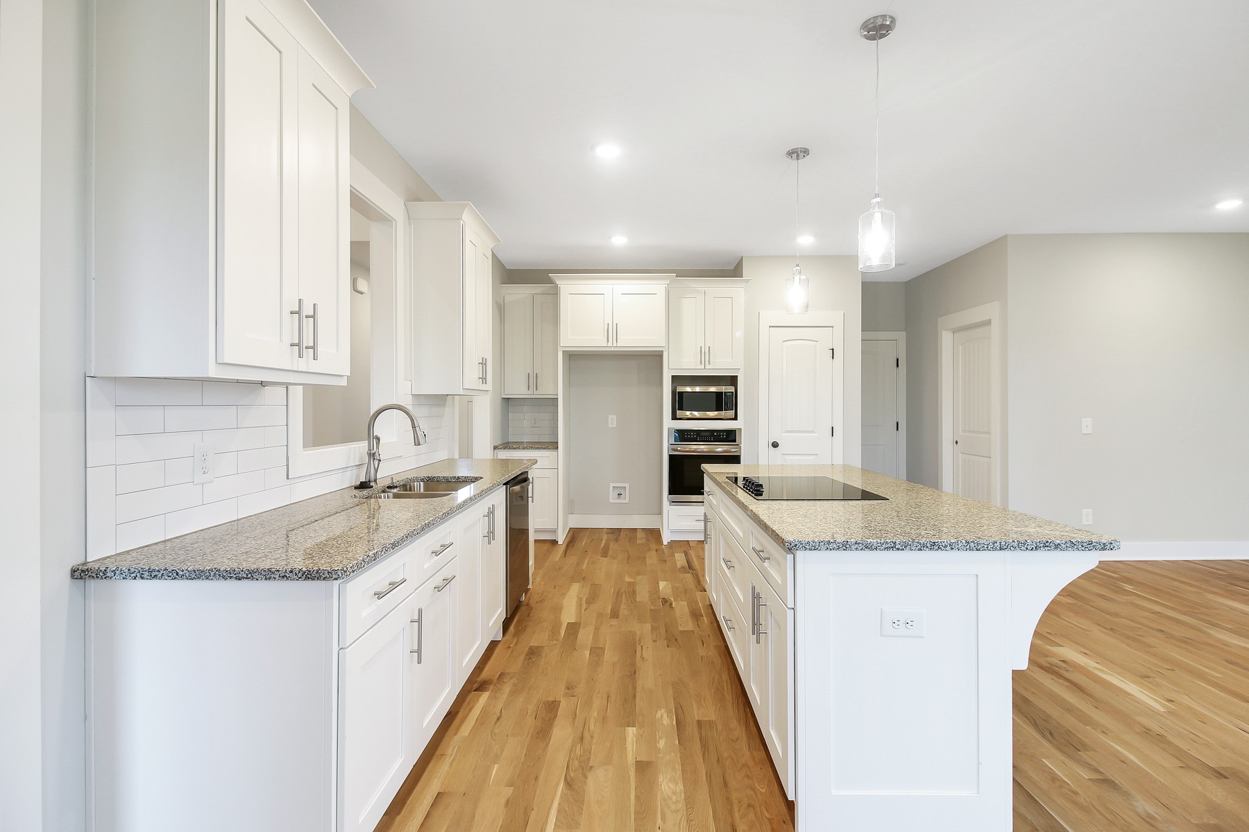 4889 Barren Plains Road Springfield, TN 37172 - Photo 6 of 17 a large kitchen with stainless steel appliances granite countertop a sink and cabinets
