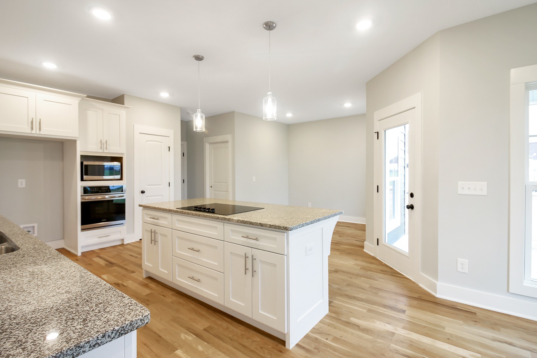 4889 Barren Plains Road Springfield, TN 37172 - Photo 7 of 17 a kitchen with stainless steel appliances granite countertop a stove a sink and a refrigerator