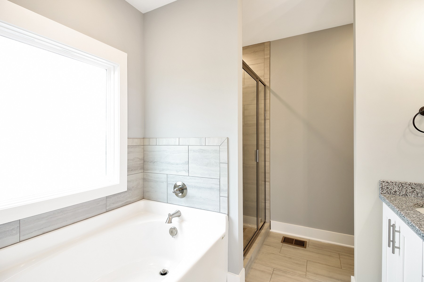 4889 Barren Plains Road Springfield, TN 37172 - Photo 10 of 17 a bathroom with a bathtub and a shower