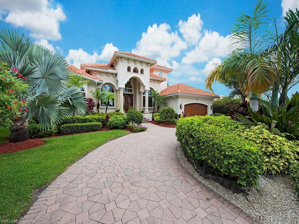 1860 Kingfish Road Naples, FL 34102 - Photo 3 of 24 Front entrance with paved circular driveway.
