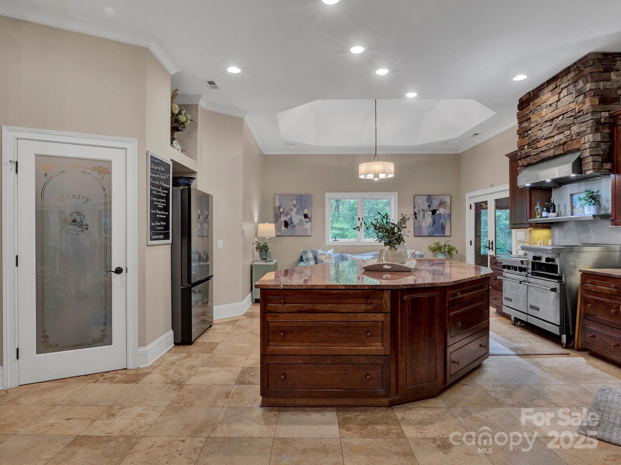 225 Riverton Road Weddington, NC 28104 - Photo 12 of 41 a kitchen with stainless steel appliances granite countertop a stove and a refrigerator