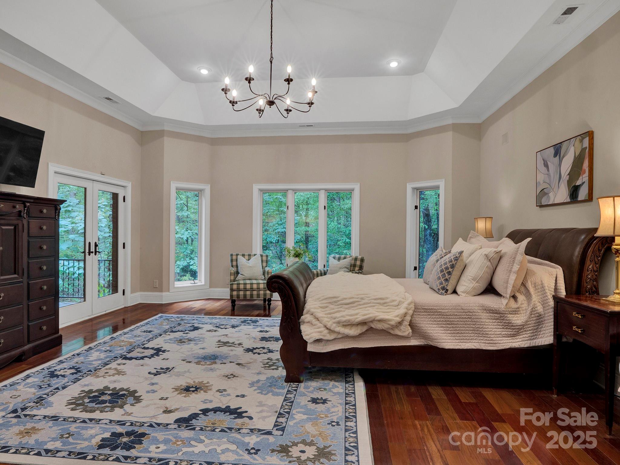 225 Riverton Road Weddington, NC 28104 - Photo 16 of 41 a bed room with a bed window and a television