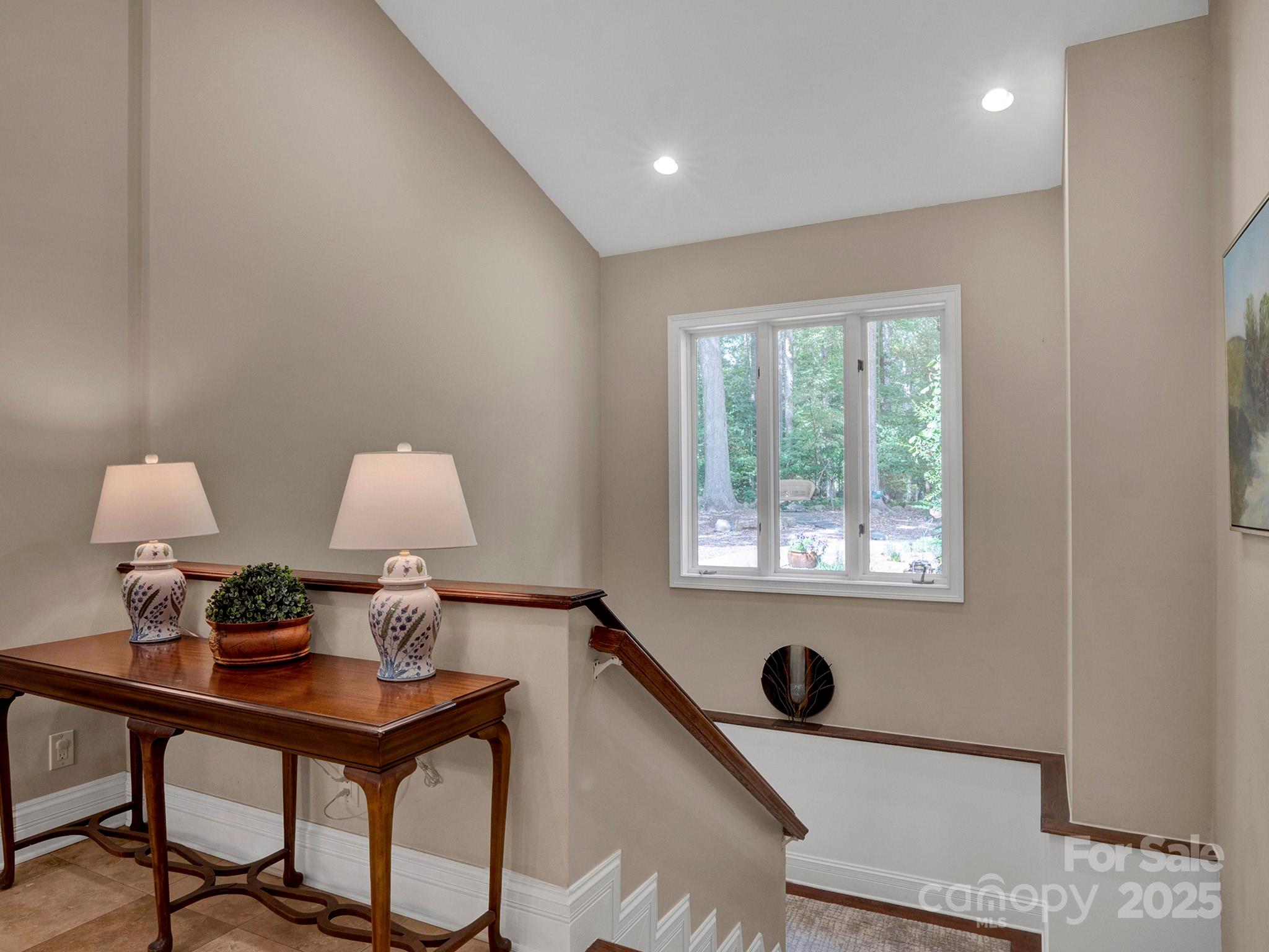 225 Riverton Road Weddington, NC 28104 - Photo 22 of 41 a living room with furniture and a window